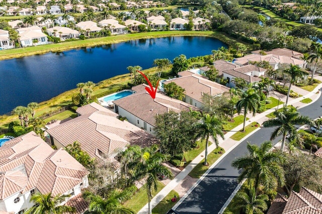 drone / aerial view with a water view