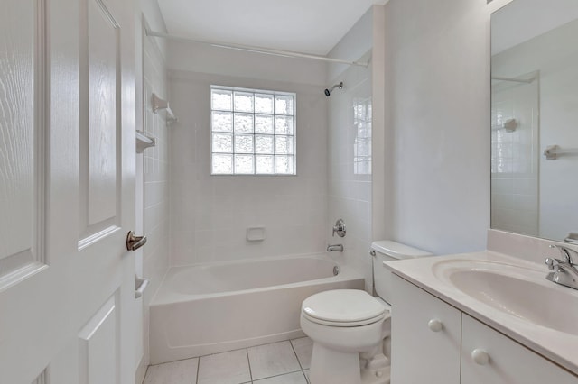 full bathroom with tile patterned flooring, vanity, toilet, and tiled shower / bath combo