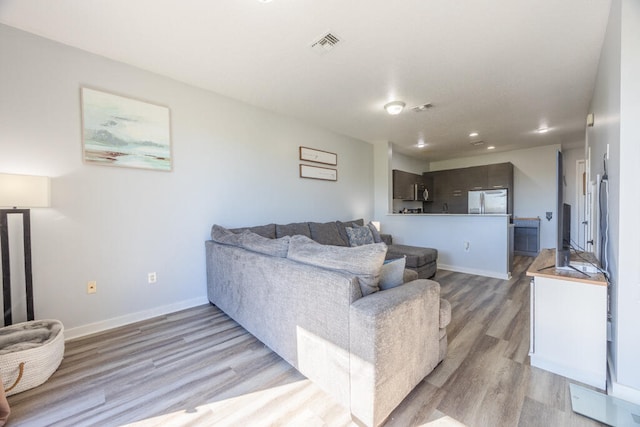 living room with light wood-type flooring