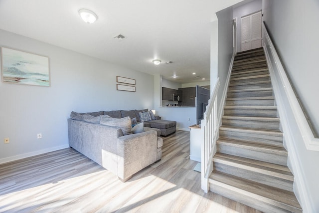 living room featuring light wood-type flooring