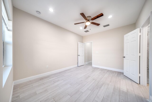 unfurnished bedroom featuring light hardwood / wood-style floors and ceiling fan