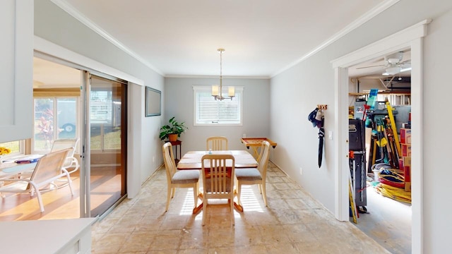 dining space with ceiling fan with notable chandelier and ornamental molding