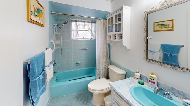 full bathroom featuring shower / bath combo, vanity, toilet, and tile patterned floors