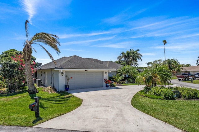 single story home with a garage, a front lawn, and central air condition unit