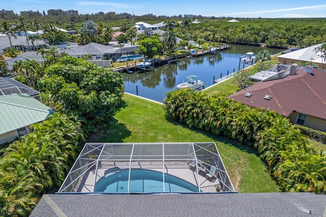 drone / aerial view with a water view