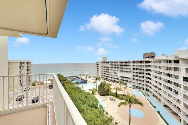 balcony featuring a water view