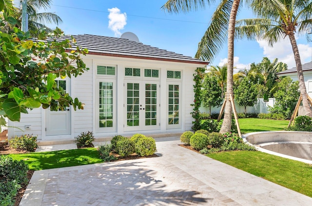 234 Miramar Way, West Palm Beach, FL 33405 - view of outbuilding featuring french doors