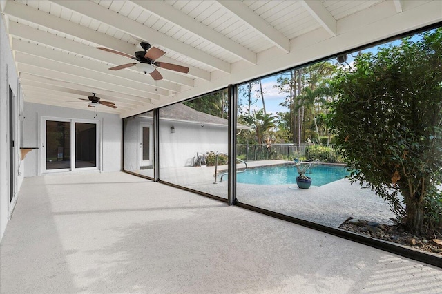 view of swimming pool featuring a patio and ceiling fan