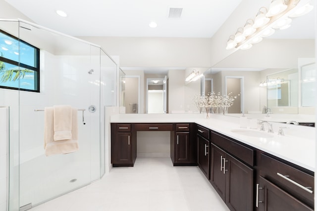 bathroom featuring vanity and walk in shower