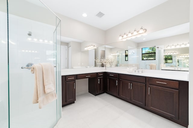 bathroom with vanity and walk in shower