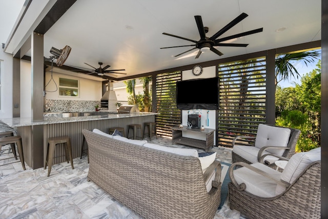 view of patio / terrace with grilling area and a bar