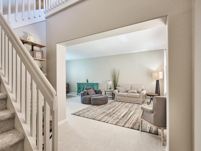 living room with light tile patterned flooring