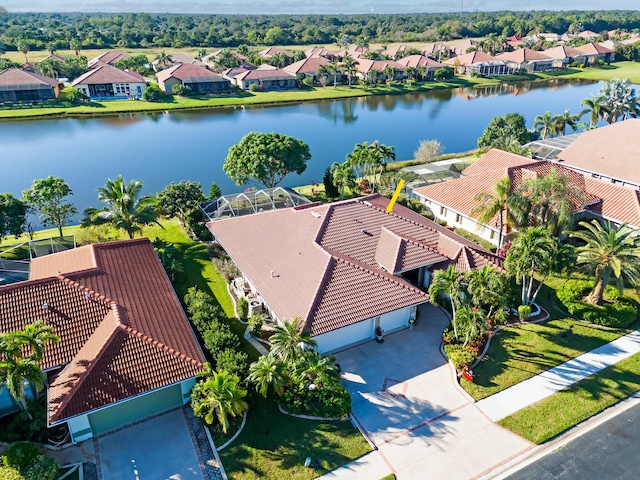 birds eye view of property featuring a water view