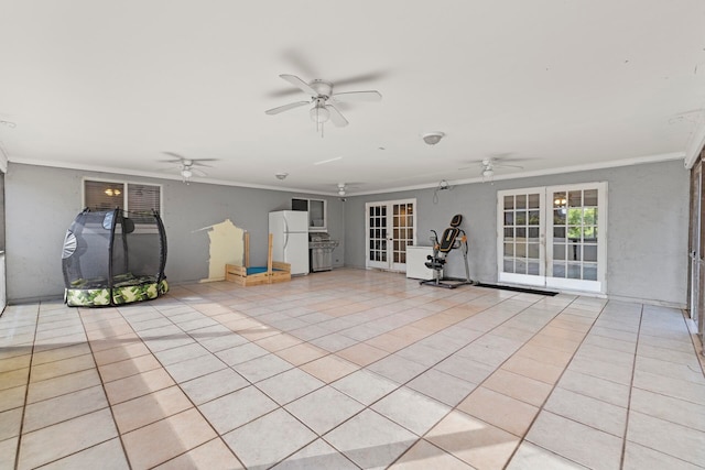 view of patio featuring french doors, area for grilling, and ceiling fan