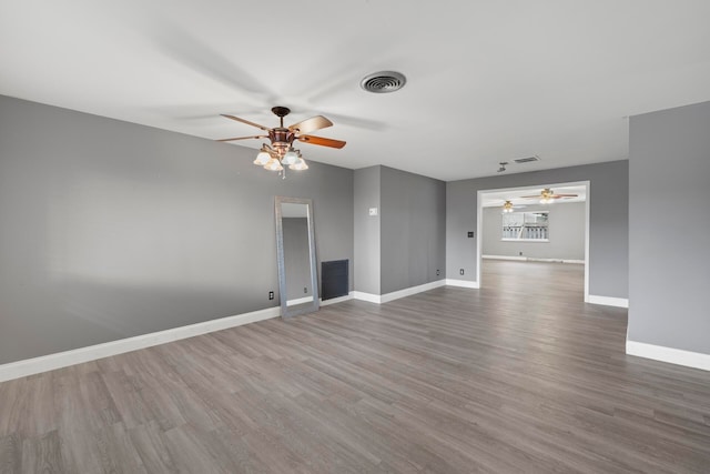 empty room featuring wood-type flooring