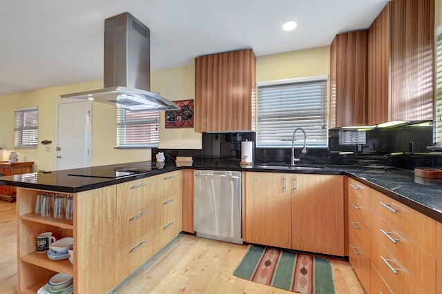 kitchen featuring kitchen peninsula, stainless steel dishwasher, island range hood, sink, and light hardwood / wood-style flooring