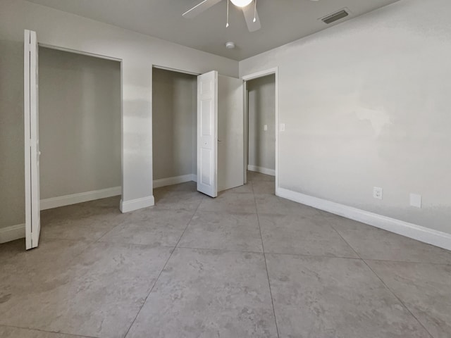 unfurnished bedroom featuring ceiling fan