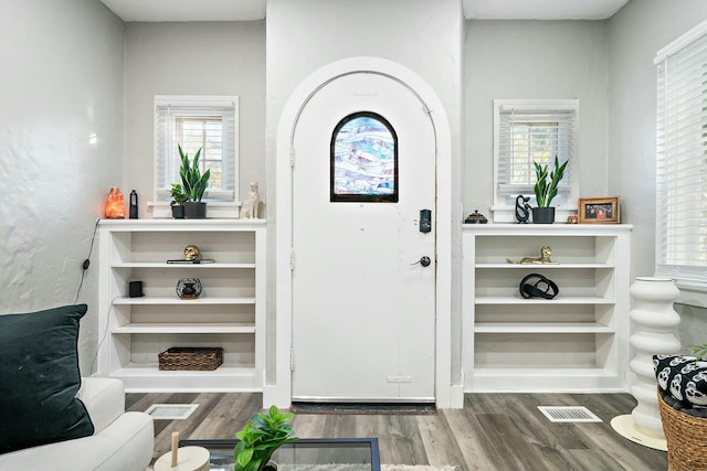 entrance foyer featuring hardwood / wood-style floors