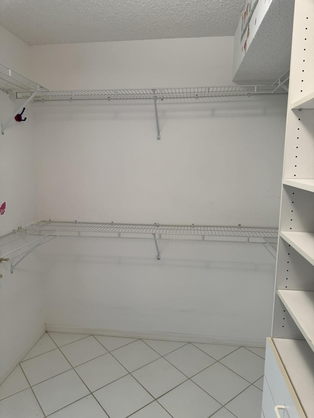 7516 N Devon Dr Unit 212, Tamarac, FL 33321 - spacious closet featuring light tile patterned floors
