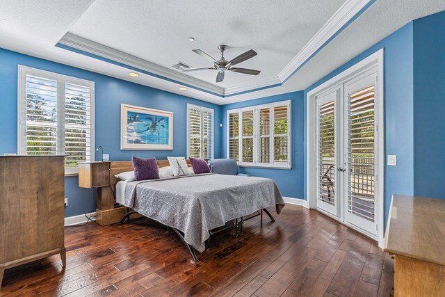 living room with french doors, ornamental molding, a high ceiling, ceiling fan, and hardwood / wood-style floors