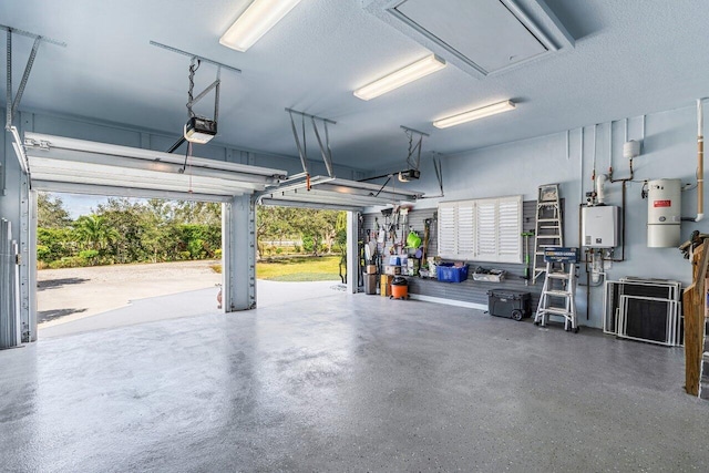 garage with tankless water heater and a garage door opener