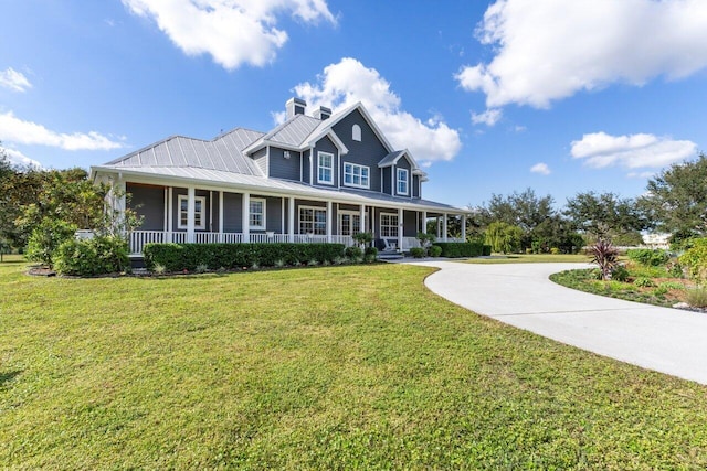 view of front facade with a porch and a front yard