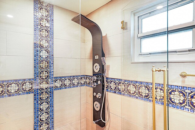 bedroom with ceiling fan, access to exterior, light tile patterned floors, and french doors