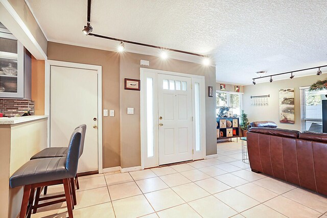 single story home featuring a garage and a front lawn