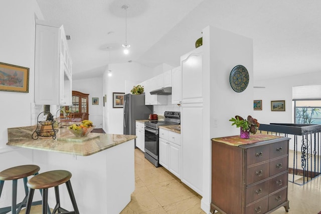 kitchen with white cabinets, kitchen peninsula, stainless steel appliances, and vaulted ceiling