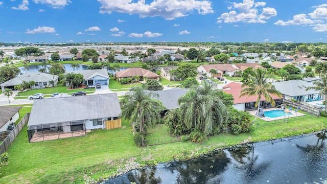 drone / aerial view with a water view