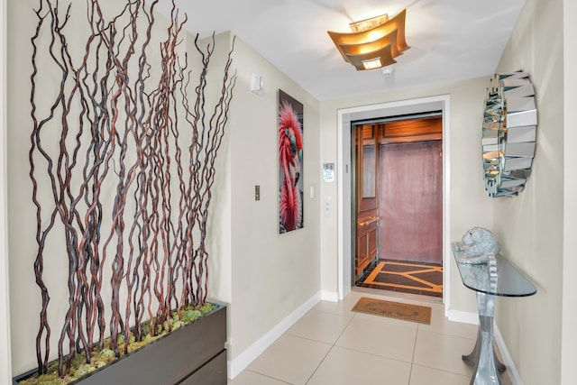 doorway featuring light tile patterned floors