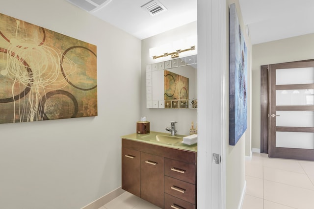 bathroom featuring tile patterned floors and vanity