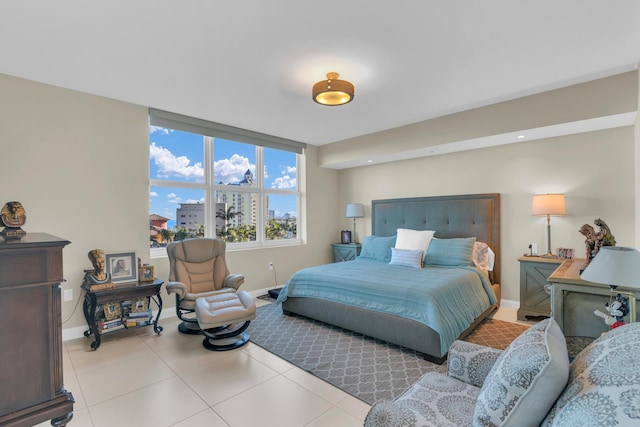 bedroom with light tile patterned flooring