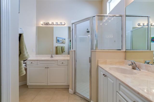 bathroom with vanity, tile patterned floors, and an enclosed shower