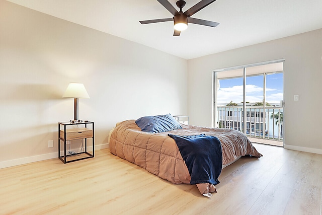 bedroom featuring light wood-type flooring, access to outside, and ceiling fan