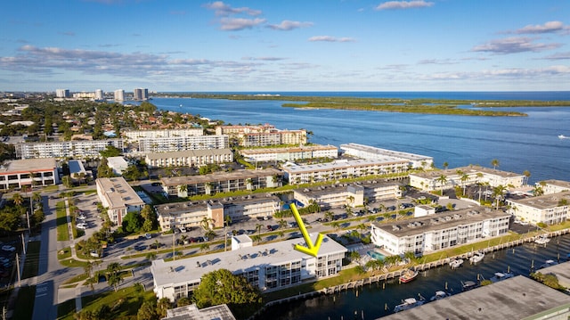 drone / aerial view with a water view