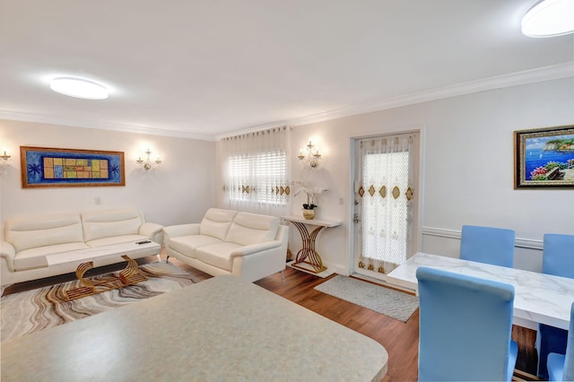 living room with ornamental molding and dark wood-type flooring