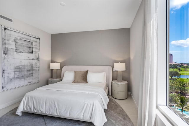 220 SE Mizner Blvd Unit 401, Boca Raton, FL 33432 - bedroom with baseboards and visible vents