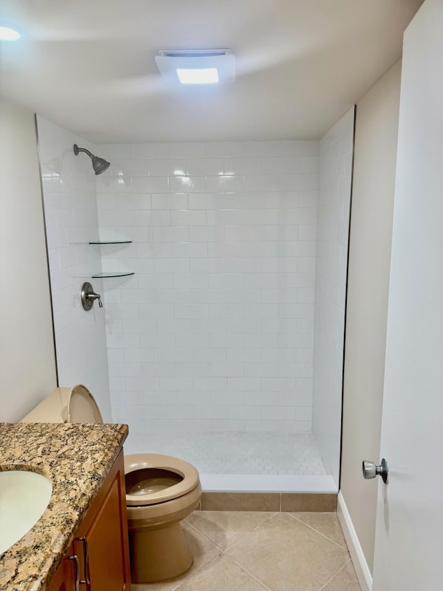 10777 W Sample Rd Unit 505, Coral Springs, FL 33065 - bathroom featuring vanity, tile patterned flooring, and tiled shower
