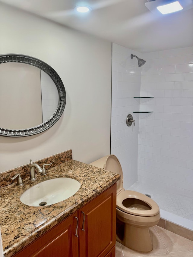 10777 W Sample Rd Unit 505, Coral Springs, FL 33065 - full bathroom featuring vanity, a tile shower, and tile patterned flooring
