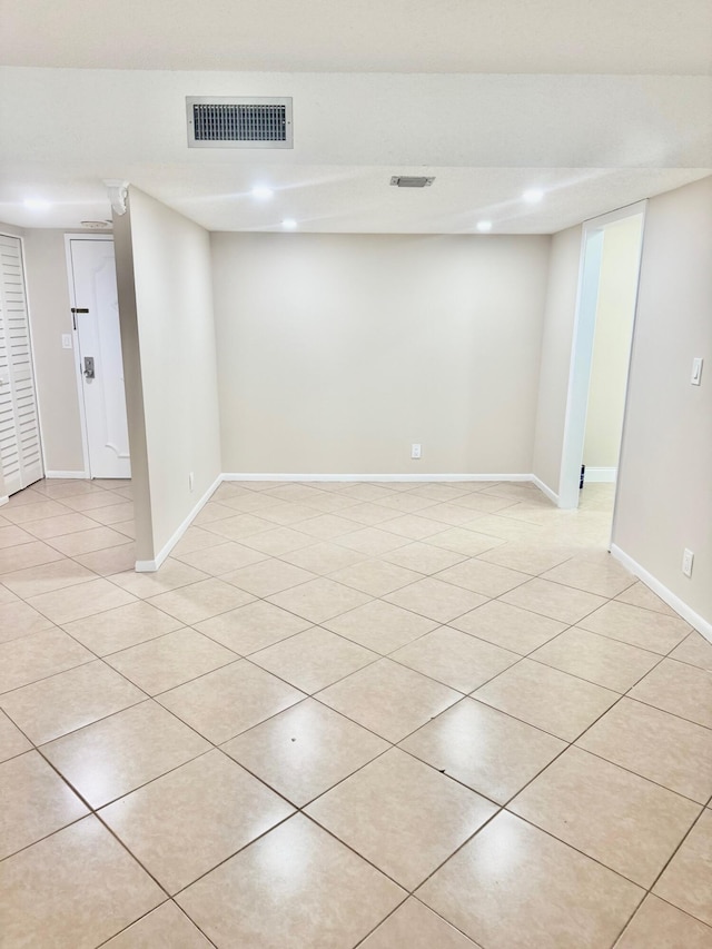 10777 W Sample Rd Unit 505, Coral Springs, FL 33065 - finished basement with light tile patterned flooring and recessed lighting