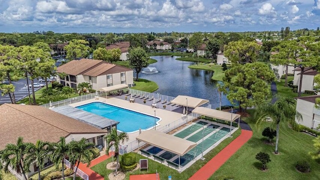 view of pool featuring a water view