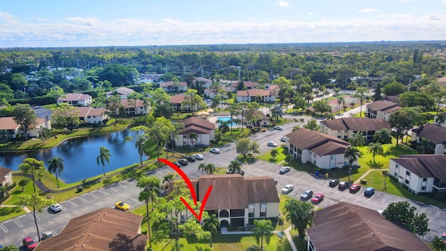 drone / aerial view featuring a water view