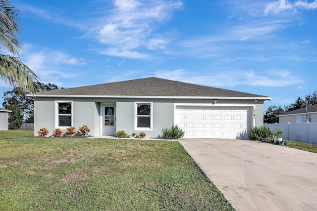 ranch-style home featuring a front yard and a garage