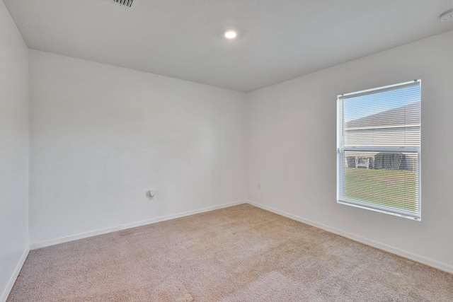 view of carpeted spare room