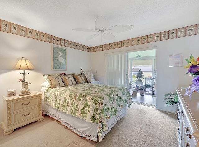 bedroom with light carpet, access to outside, a textured ceiling, and ceiling fan