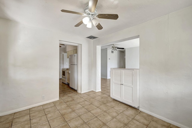 interior space featuring ceiling fan