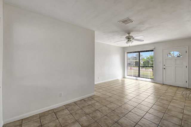 interior space featuring ceiling fan