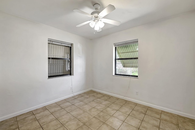 spare room featuring ceiling fan