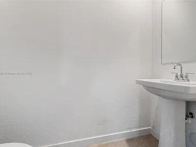 bathroom featuring toilet